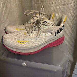 Hokas in white and pink